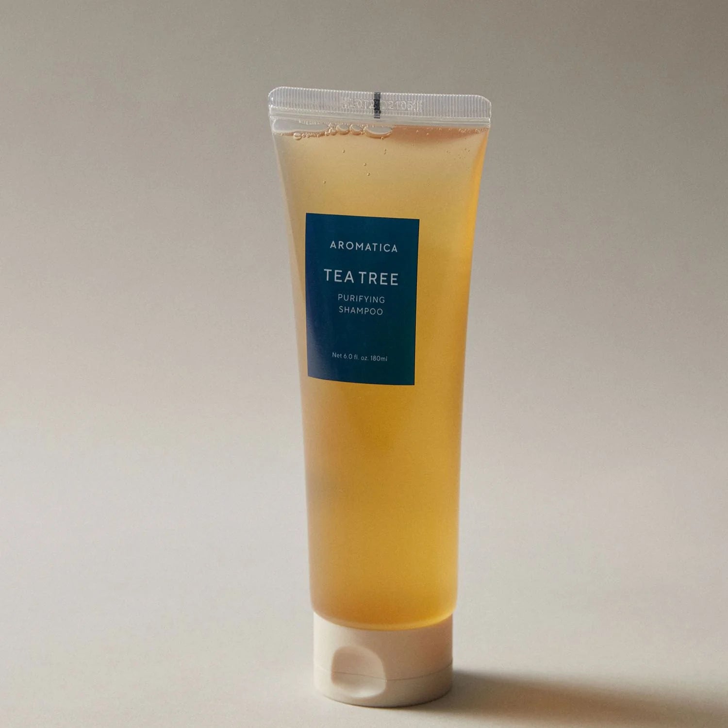 شامبو أروماتيكا للتنقية العميقة والعناية بفروة الرأس بخلاصة شجرة الشاي – 180 مل